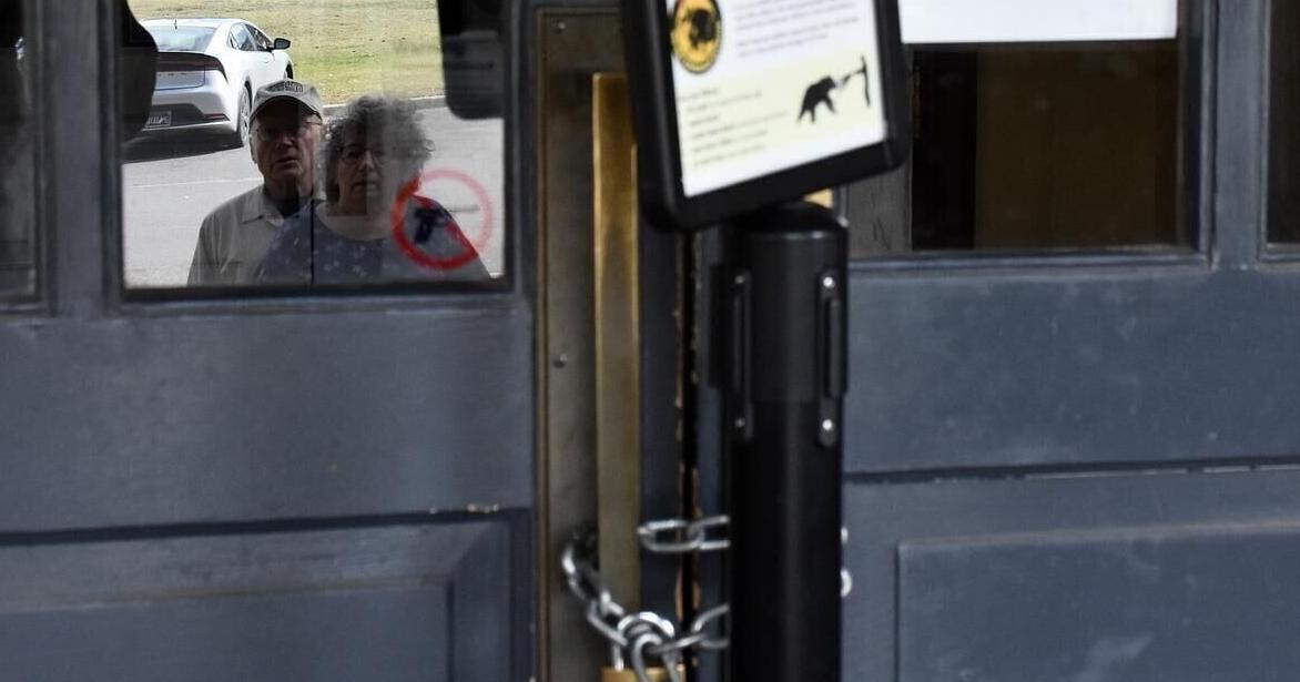 Park visitors find open gates at Yellowstone on first day of government shutdown