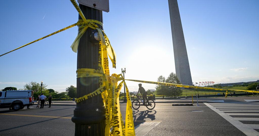 Secret Service says suspect opened fire on them and was shot in exchange near Washington Monument