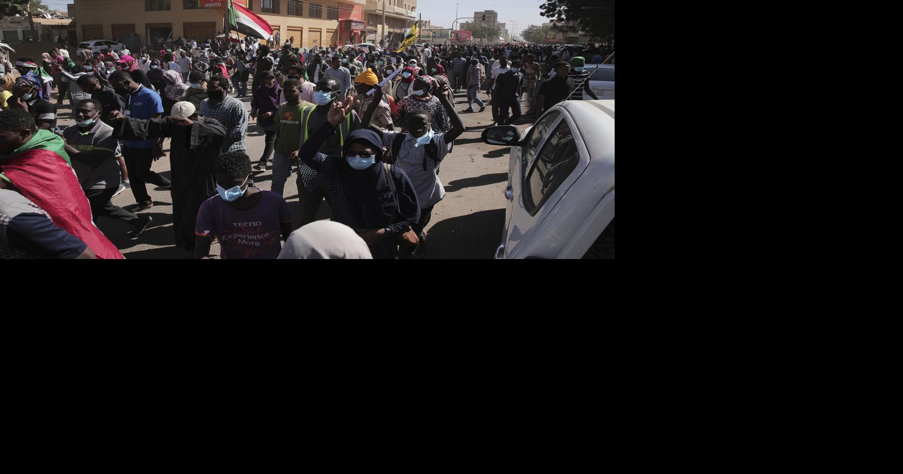 At least four anti-coup protesters shot dead in Sudan as security forces raid broadcasters