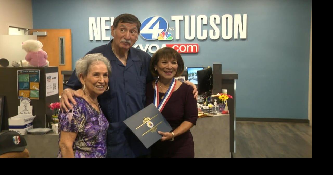 News 4 Tucson Lupita Murillo receiving a certificate special medallon