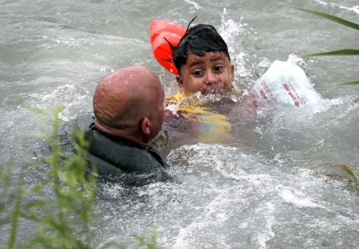 Photos show Border Patrol saving migrant boy from drowning | News ...