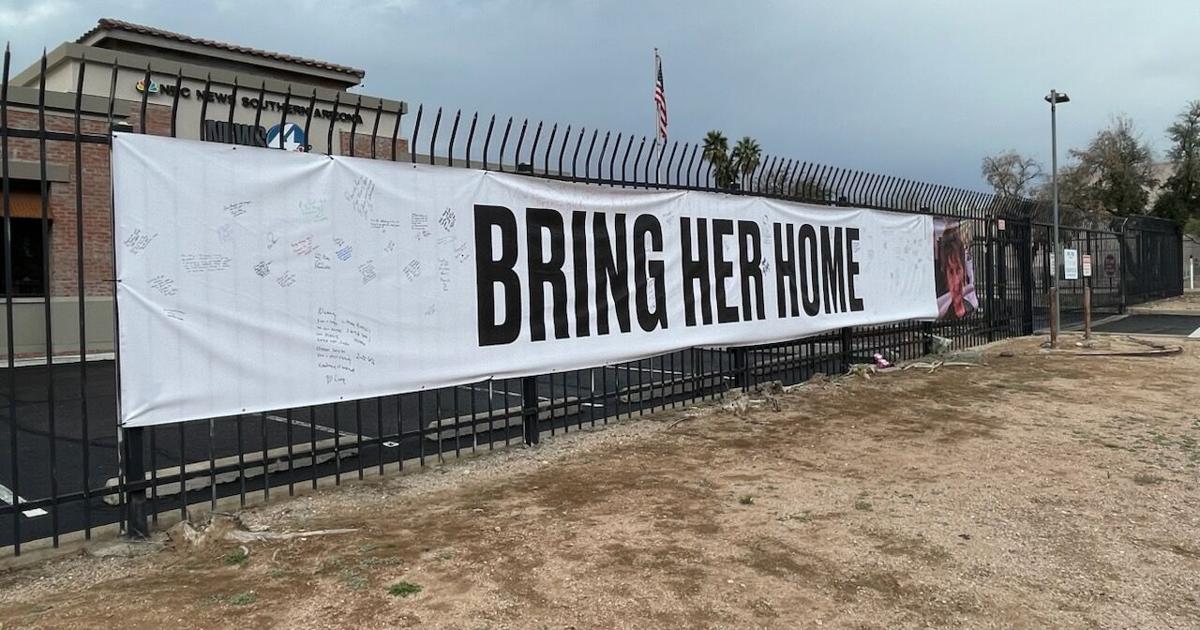 Guthrie banner outside News 4 Tucson brings community together | The Disappearance of Nancy Guthrie | kvoa.com