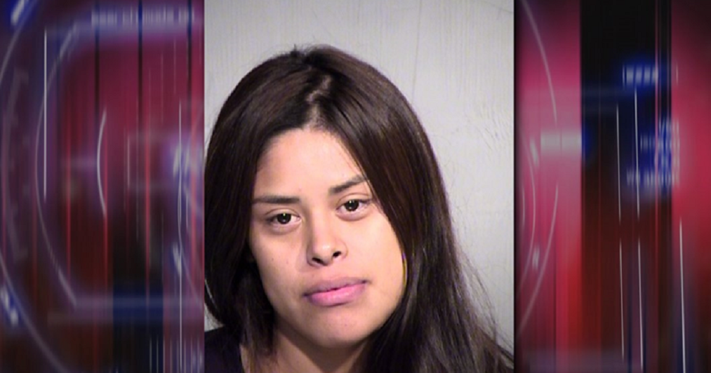 Woman arrested for DUI was holding her child while driving, police say ...