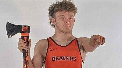 Austin Scott (22) signs with Oregon State