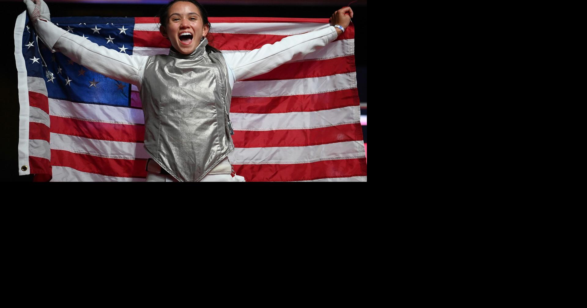 Lee Kiefer celebrates winning a gold medal in women's individual foil