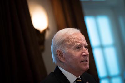 Biden signs infrastructure bill into law at rare bipartisan gathering