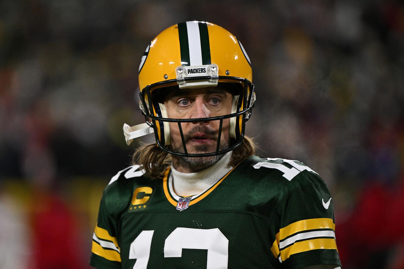 Aaron Rodgers says he will stay with the Green Bay Packers