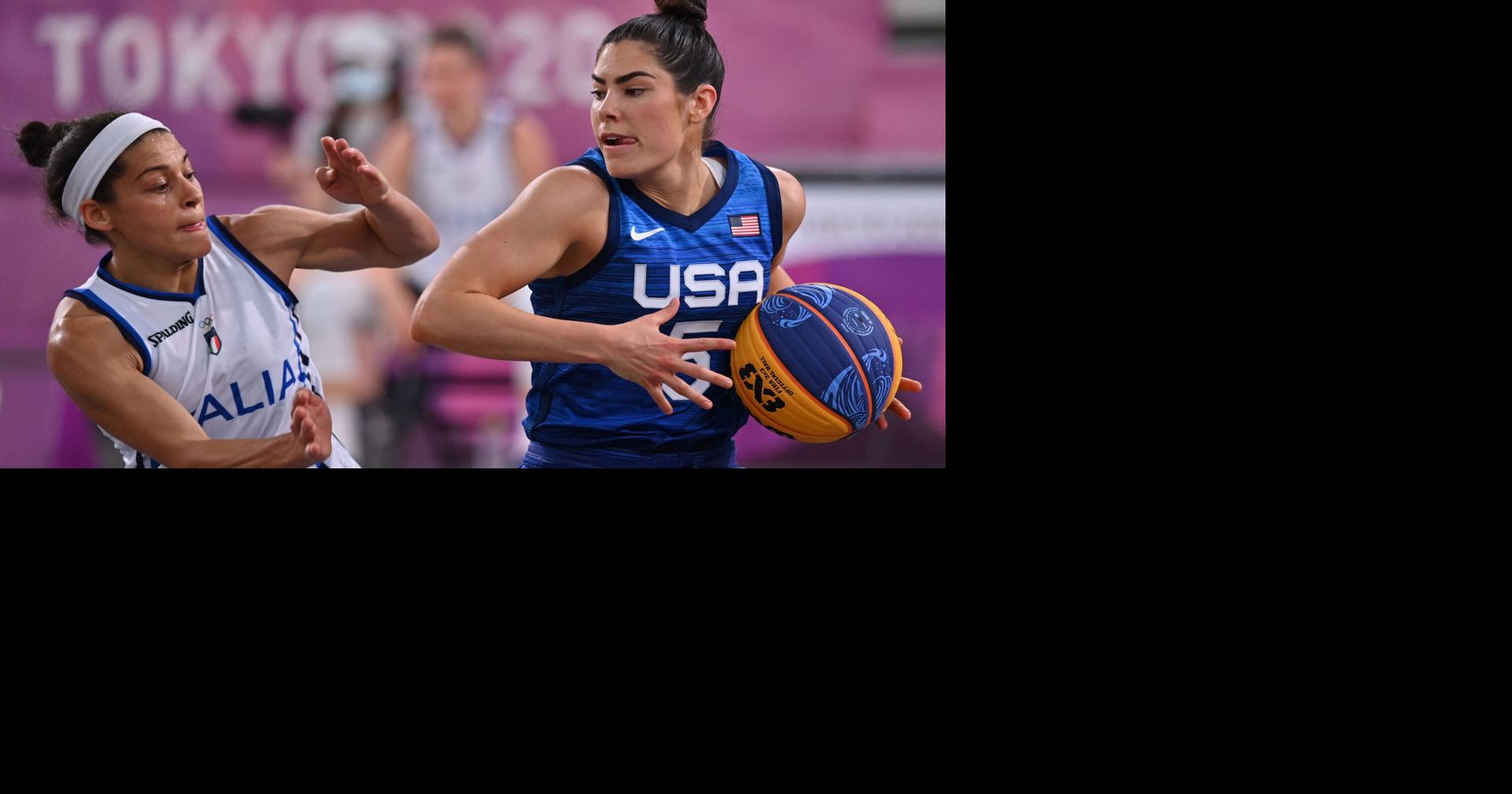 USA's Kelsey Plum takes on a member of Team Italy in a 3x3 basketball