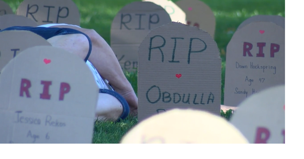 Non-Violence group in Dubuque hosts 'die-in' to highlight dangers of