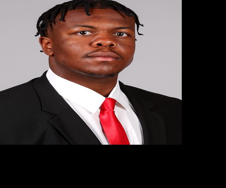 Georgia football player Devin Willock, staff member Chandler