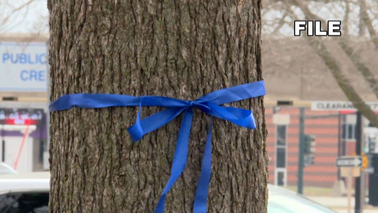 Child Abuse Prevention Month: Blue ribbon tying takes place across