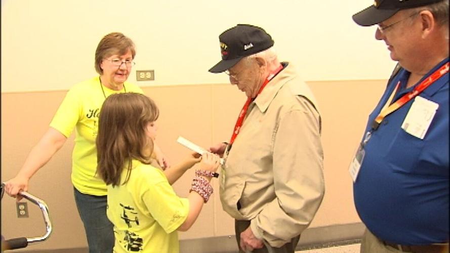 Gallery: Honor Flight pays tribute to Shell 77 crew | Local News | kxly.com