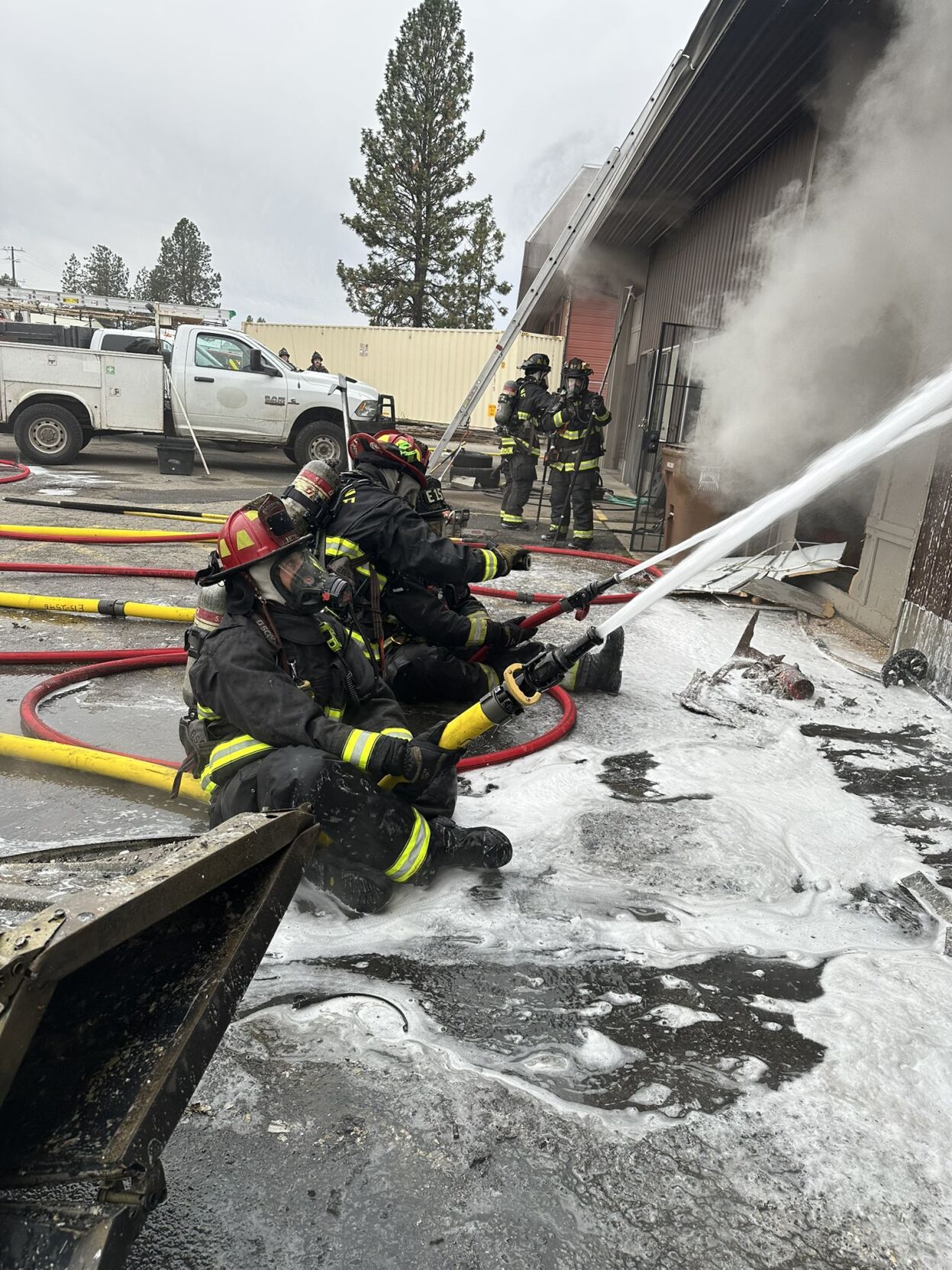 Fire spreads through multiple businesses in North Spokane auto shop ...