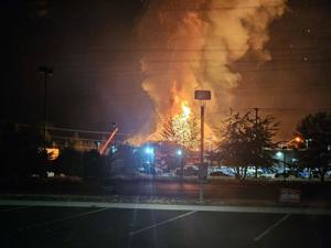 Crews battling multi-alarm fire on Newport Highway in North Spokane