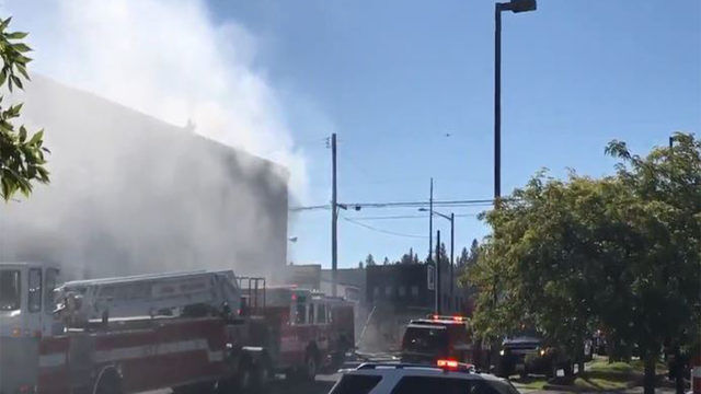 Crews fighting 2nd alarm fire in downtown apartment building | Local ...