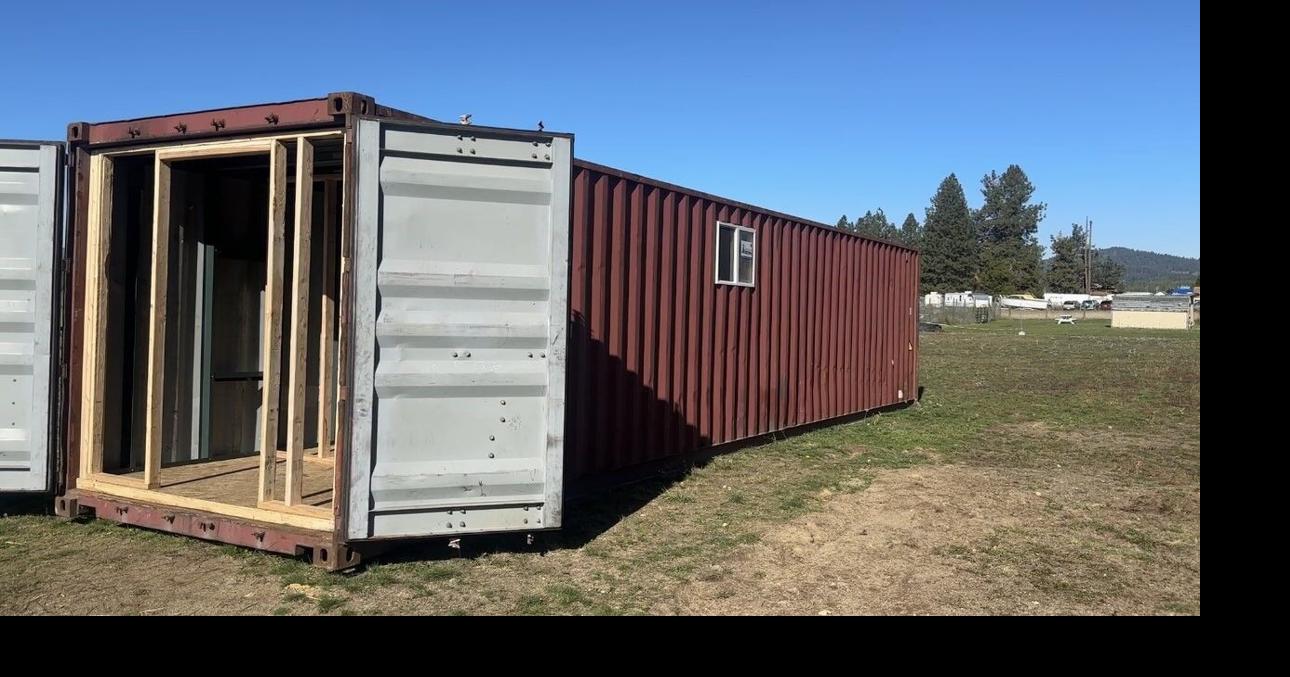 Elk community members converting large containers into tiny homes for