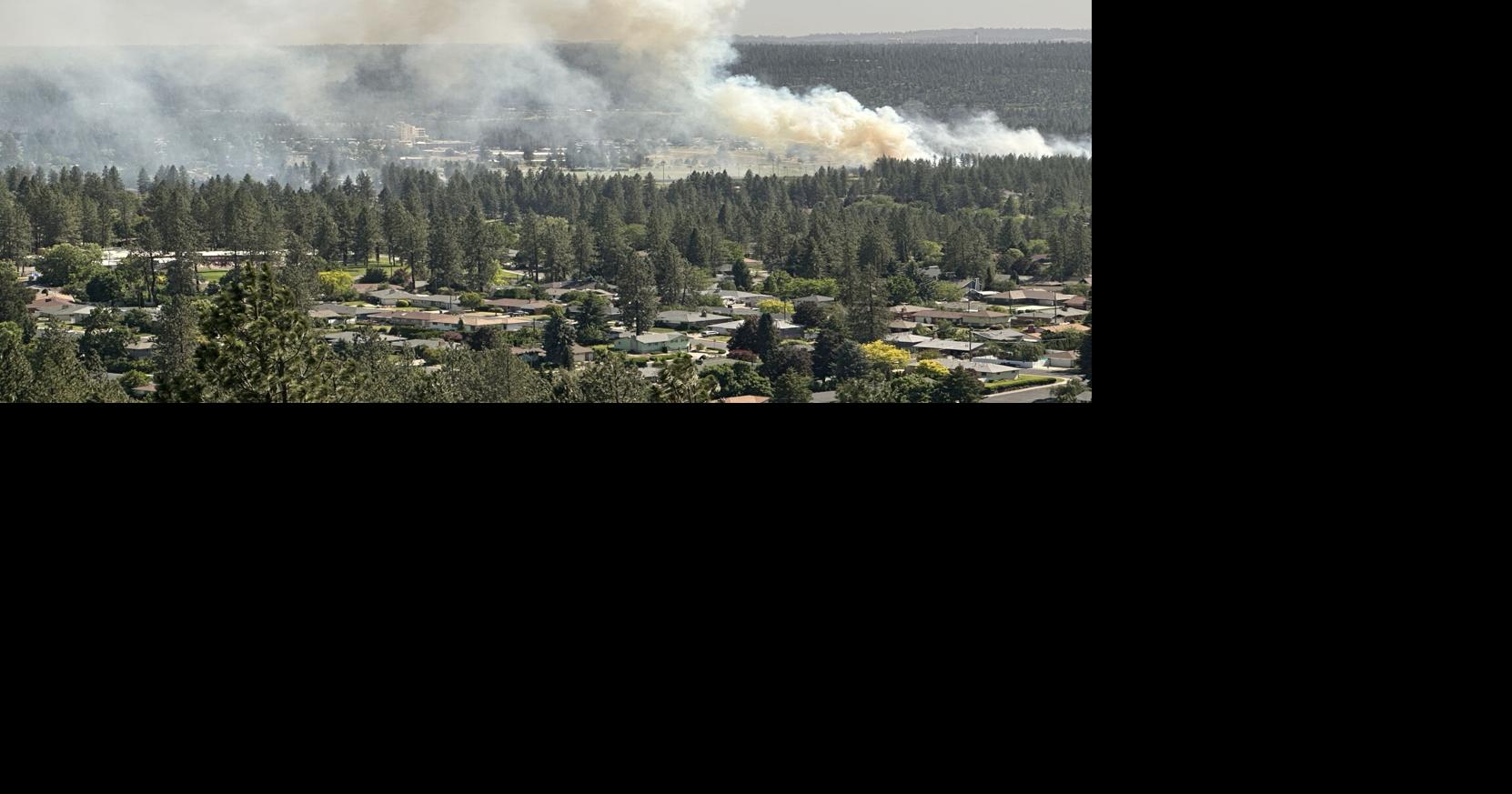 Fire crews battling flames near Dwight Merkel Sports Complex in north Spokane