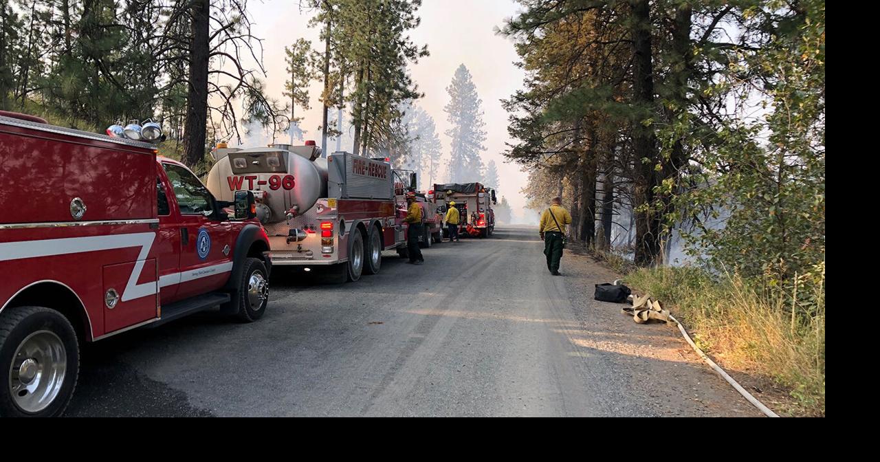 Wildfire southeast of Chattaroy now fully lined | Local News | kxly.com