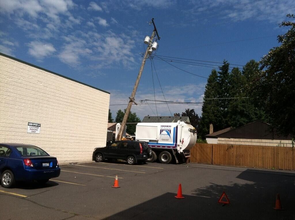 Garbage truck hits power pole, knocks out power to NorthTown | Spokane ...