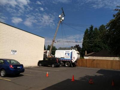 Garbage truck hits power pole, knocks out power to NorthTown | Spokane ...