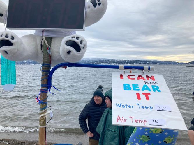 Frigid temperatures don’t stop annual Polar Bear Plunge into Lake Coeur