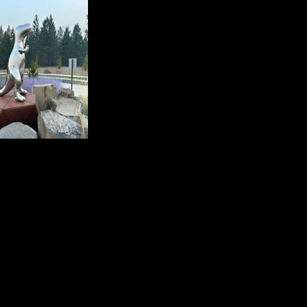 Stolen T.rex statue returned home to Mead roundabout