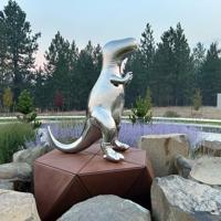 Stolen T.rex statue returned home to Mead roundabout