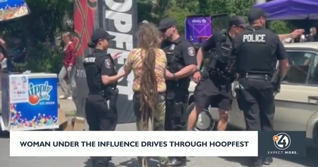WATCH: Woman arrested for DUI seen driving through Hoopfest | News ...