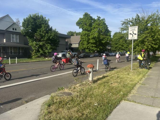 West Central Spokane bike bus program helps students ride safely to ...