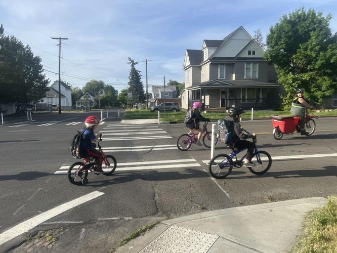 West Central Spokane bike bus program helps students ride safely to ...