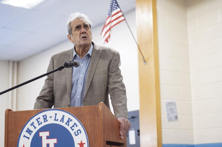 Bill Athanas at podium