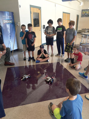 Robotics camp - GHS FIRST team teaches younger kids how to team up with tech
