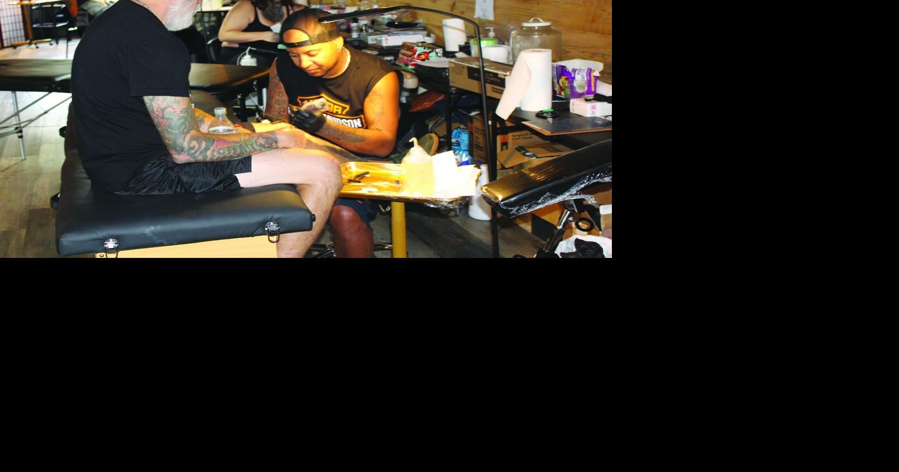 Cursed World tattoo artists give bikers memories that last beyond Motorcycle Week