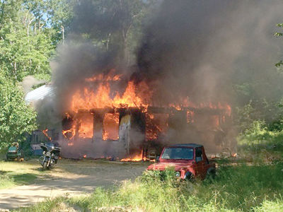 Dog and cat rescued from fire, Gilmanton home is destroyed