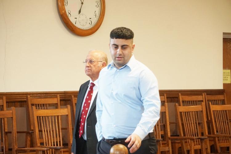 Hassan Sapry enters court