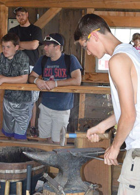 Worknman brothers learning to master blacksmith skills