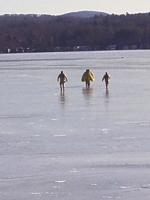 Fire personnel rescue dog on Lake Winnisquam