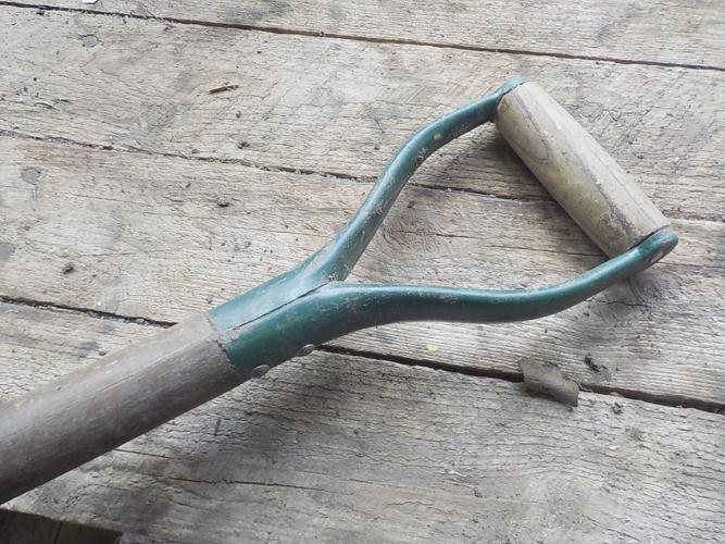 I like shovels with a D-handle for a good grip