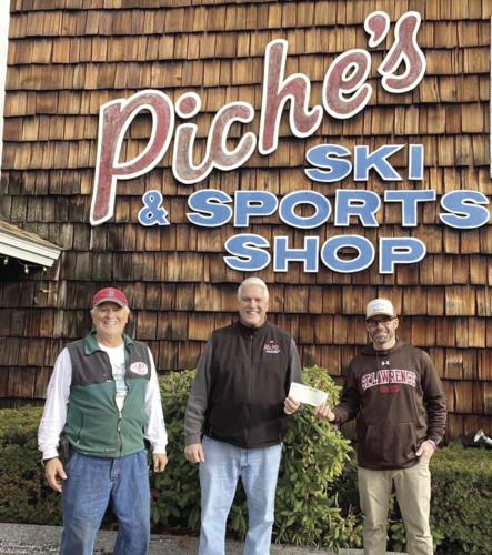 12-10 Cash and Cans donation.jpg