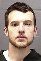 Man charged with hitting officers with his car as he fled traffic stop