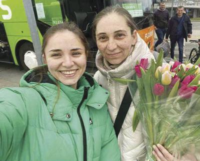 Elena Fomenko joining her daughter after arriving safely in Hamburg Germany.