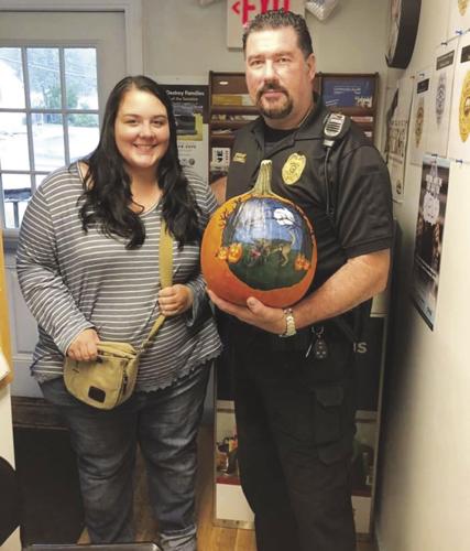 Ashley Turcotte with pumpkin