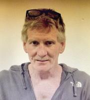 Police search woods near Country Club Road for armed, dangerous man