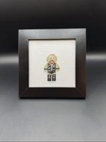 The art of cross stitch…and wrestling