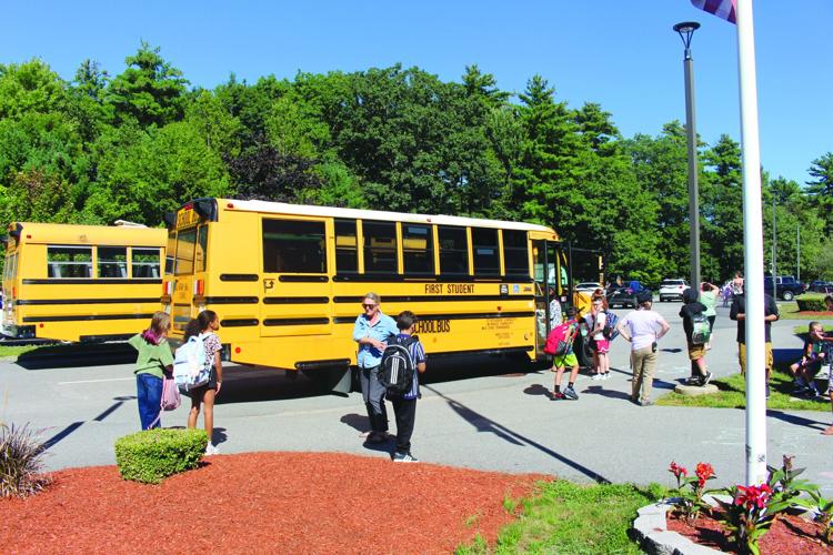 Students board buses
