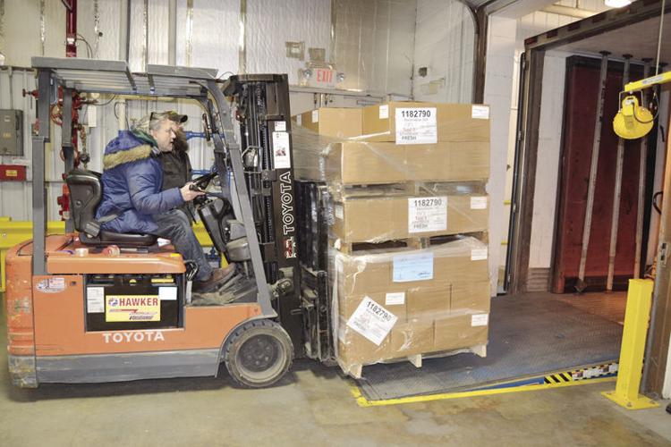 12-26 catholic charity forklift