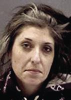Wanted woman, found hiding in closet, arrested