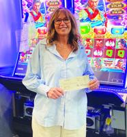 Lakes Region Casino makes donation to Gilmanton library