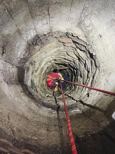 Oregon firefighters rescue dog that fell into well