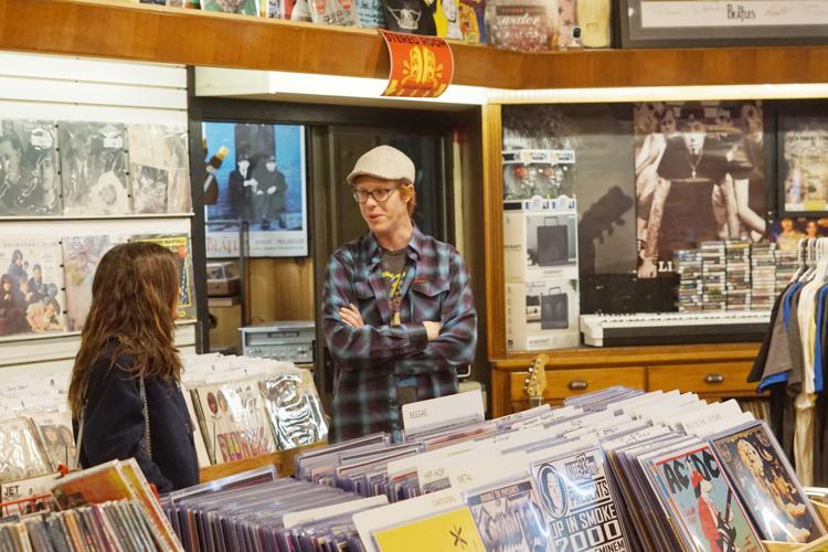 Dan McLaughlin helps a customer